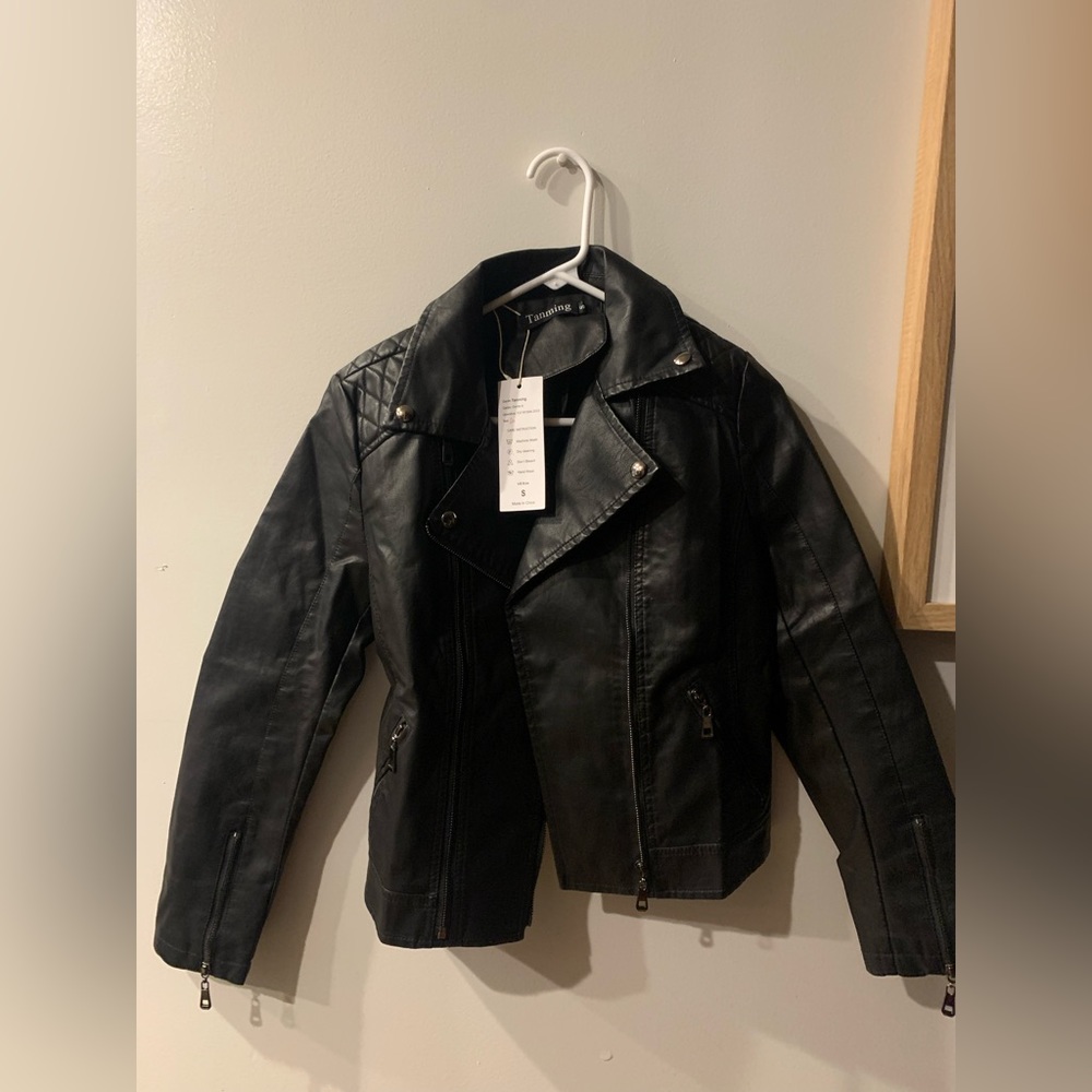 Black leather jacket new with tags !
